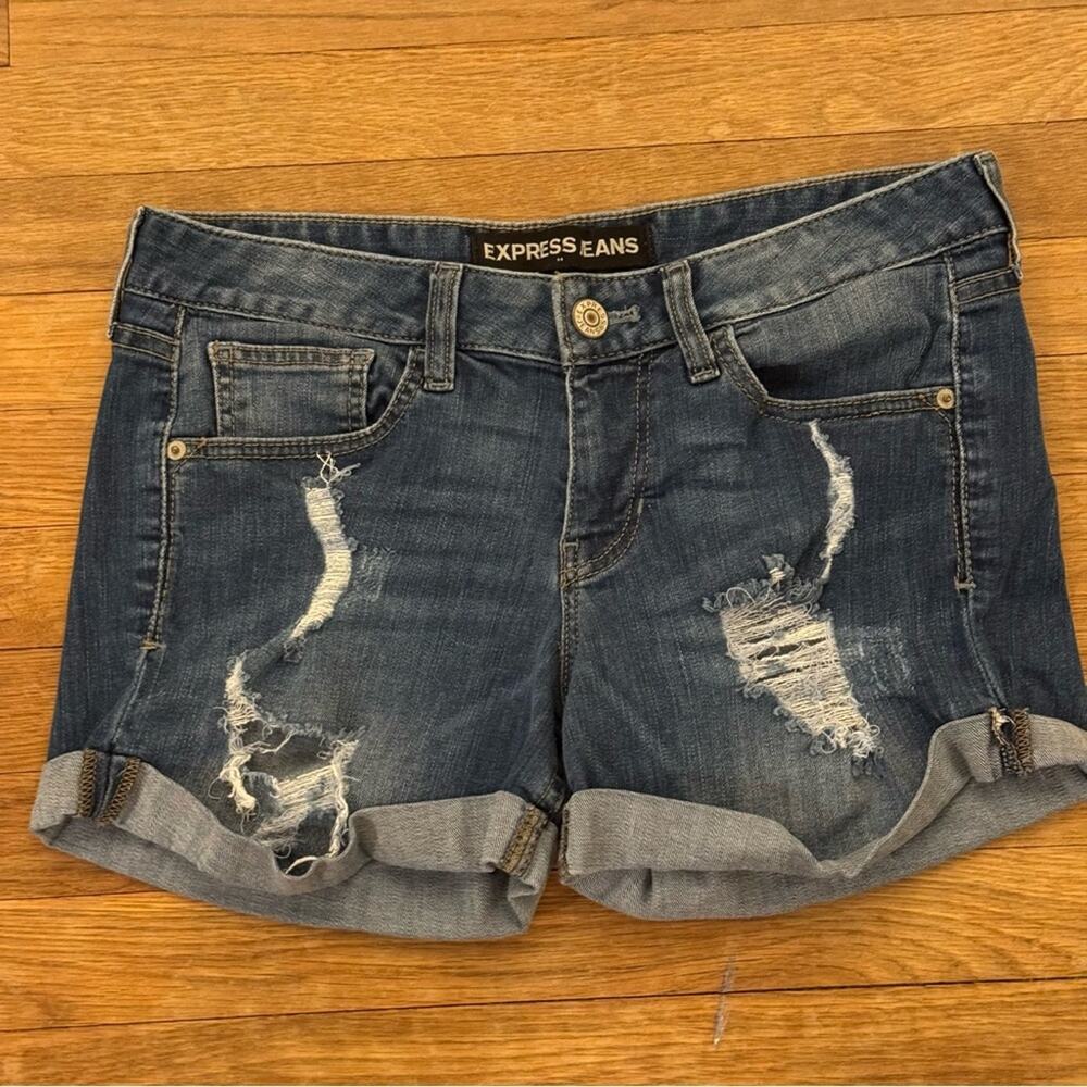 Express dark wash distressed shorts size 8
 b46